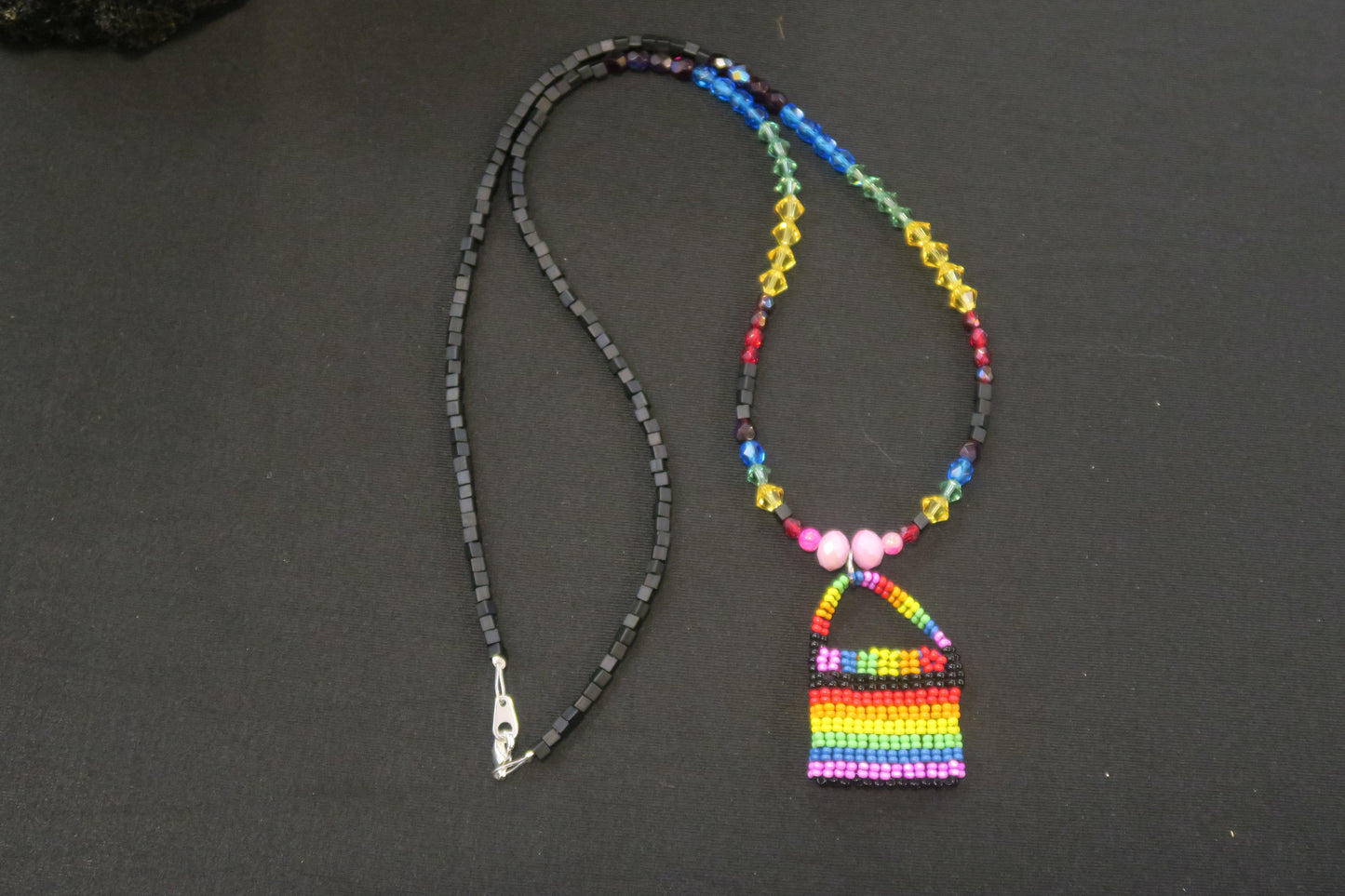 Rainbow Haisla Collins pendant with wood and swaroski crystal beads